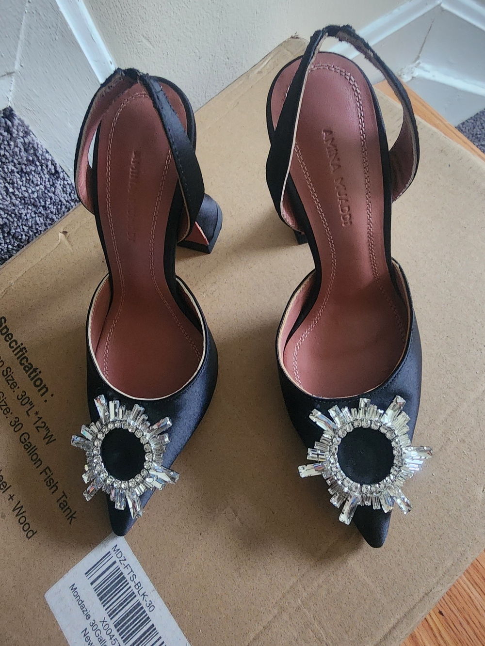Amina Muaddi Black Satin Pointed Toe Heels with Crystal Sunburst Brooch